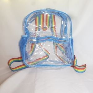 NWOT Clear backpack with rainbow straps and blue trim
